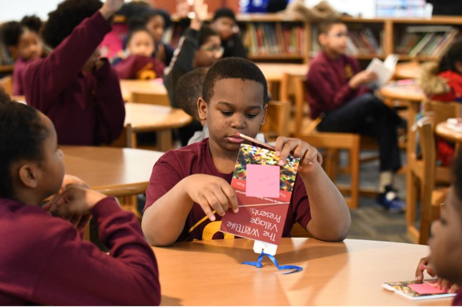 Photos: Dayton Strong! Kids receive copies of book they wrote about tornadoes