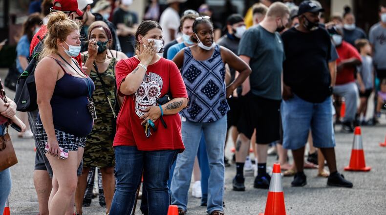 Montgomery County health offered free COVID-19 along with a $100 gift card at the Dayton Metro Library in Huber Heights. Jim Noelker/Staff