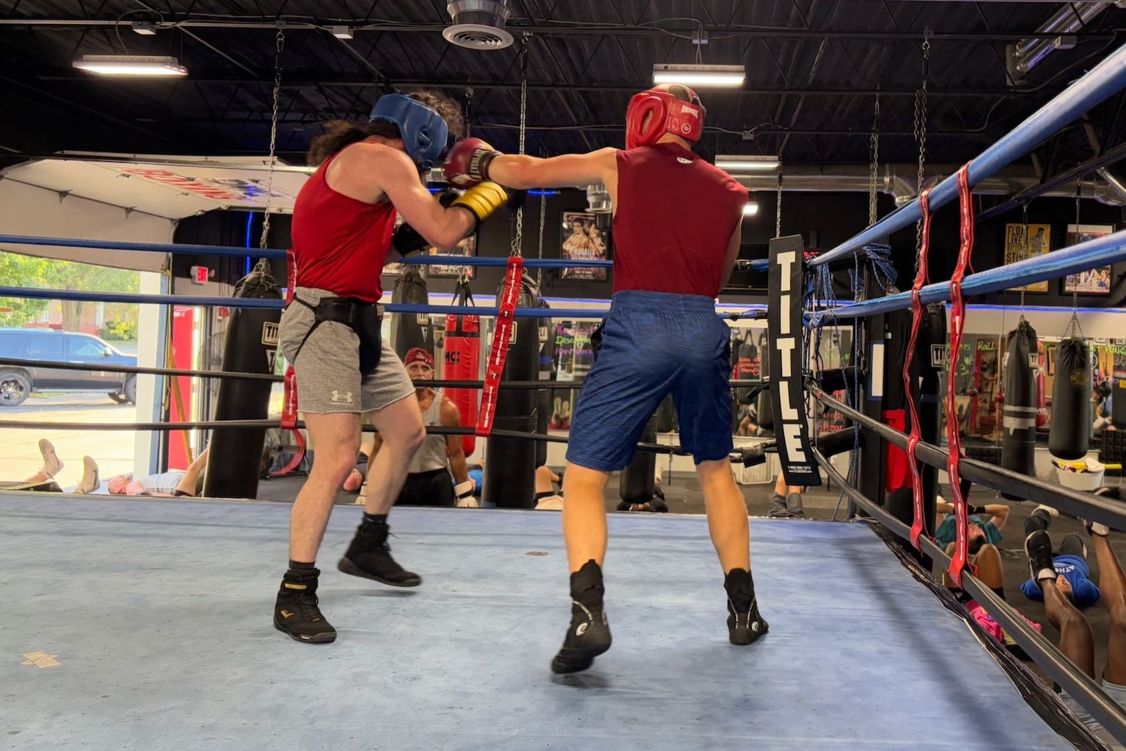 Promising Ukrainian teenager Stas Burylenko who came here from Odessa, Ukraine lands a left hand on the star of the gym Andrew Zammitt during a sparring session the other night. TOM ARCHDEACON / CONTRIBUTED PHOTO