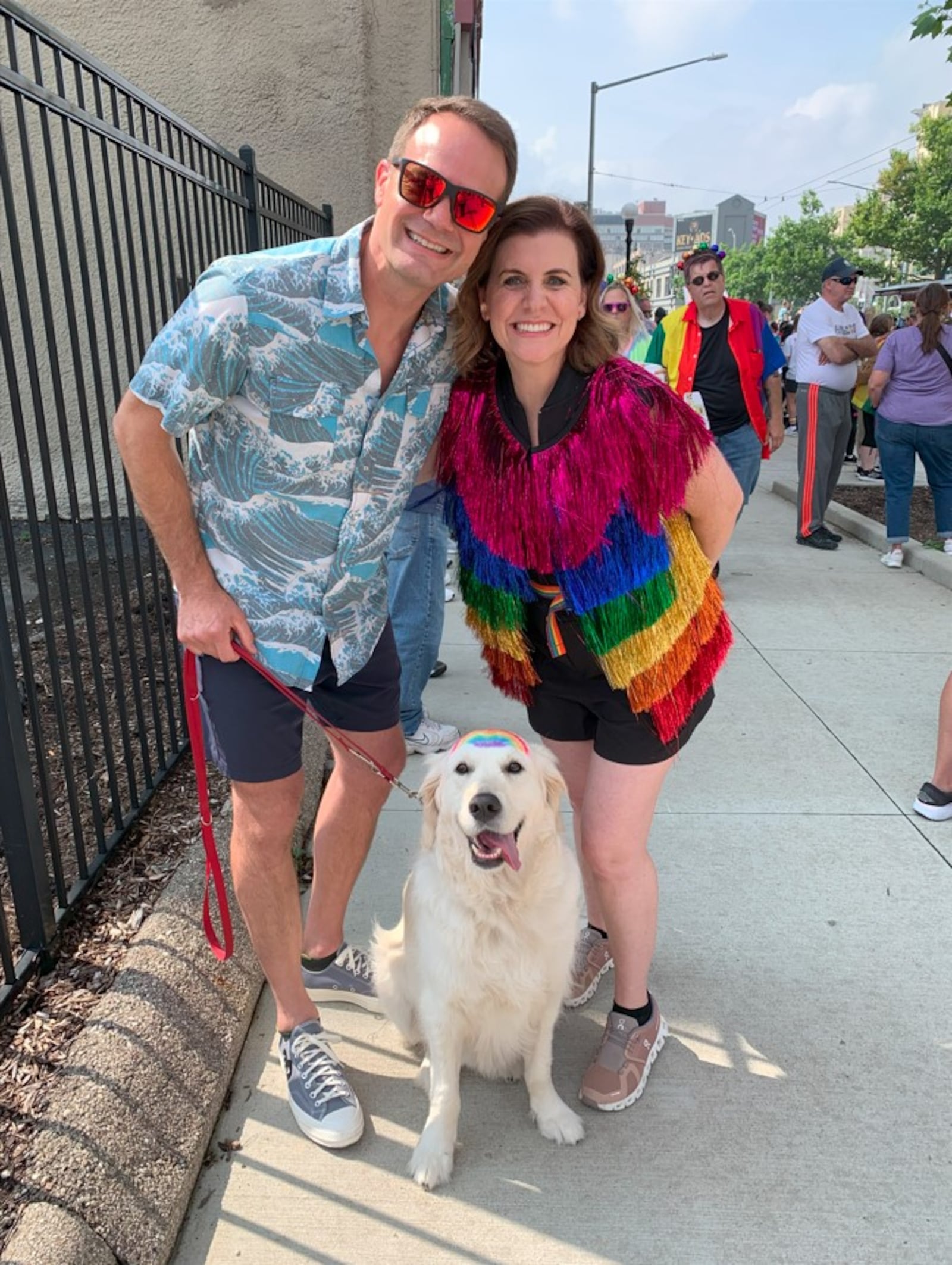 Richard and Andrea Manchur with their dog Pax, which means peace in Latin, at the Dayton Pride Parade and Festival 2025. Brooke Spurlock/Staff