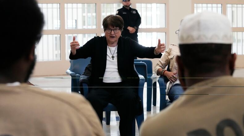 Sister Helen Prejean talks to detainees during a book club at Department Of Corrections Division 11 in Chicago, Monday, April 22, 2024. DePaul students and detainees are currently reading Dead Man Walking and the author, anti death penalty advocate, Sister Helen Prejean attended to lead a discussion. (AP Photo/Nam Y. Huh)