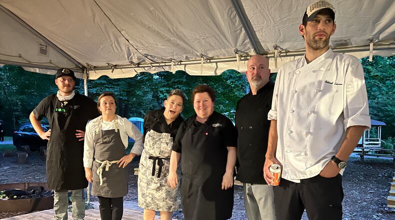 Chefs take the stage at Whoo Cooks for You fundraising benefit for the Glen Helen Ecology Institute in Yellow Springs. They are from left, Chefs Clayton Horrighs, Speakeasy Ramen; Casey Van Voorhis, Grist; Liz Valenti, Wheat Penny; Carrie Walters, Dorothy Lane, Market; Dave Rawson, Meadowlark; and Roland Eliason, Winds Cafe.