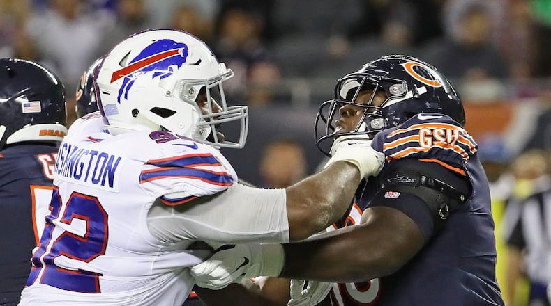 CHICAGO, IL - AUGUST 30: James Daniels #68 of the Chicago Bears blocks Adolphus Washington #92 of the Buffalo Bills during a preseason game at Soldier Field on August 30, 2018 in Chicago, Illinois. (Photo by Jonathan Daniel/Getty Images)