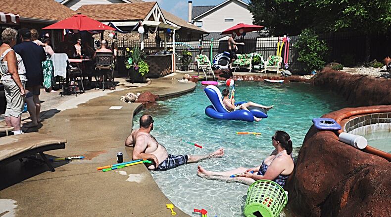 A woman rescued her 3-year-old cousin from the bottom of a backyard pool during a Fourth of July pool party at her aunt's Prairie Creek Court home in Huber Heights.