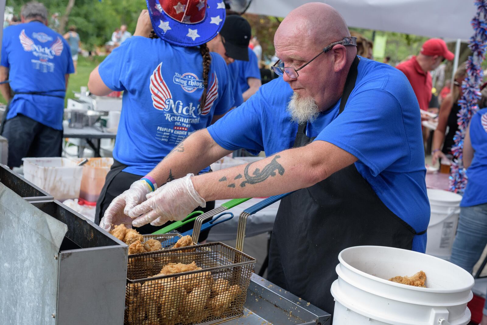 The Kickin’ Chicken Wing Fest, hosted by the Miami Valley Restaurant Association was held at Fraze Pavilion on Saturday, July 9, 2022. Featured vendors included Smokin’ Inferno BBQ & Catering, Archer’s Tavern Centerville, JA’s & Sweet-umms, Nick’s Restaurant, Chicken Head’s Ghost Kitchen, Romer’s, Pies & Pints Pizzeria, Sophia & Mak’s Caribbean Cuisine, Kahuna Grindz, Rolling Indulgence, El Meson and WingTime. Did we spot you there? TOM GILLIAM / CONTRIBUTING PHOTOGRAPHER