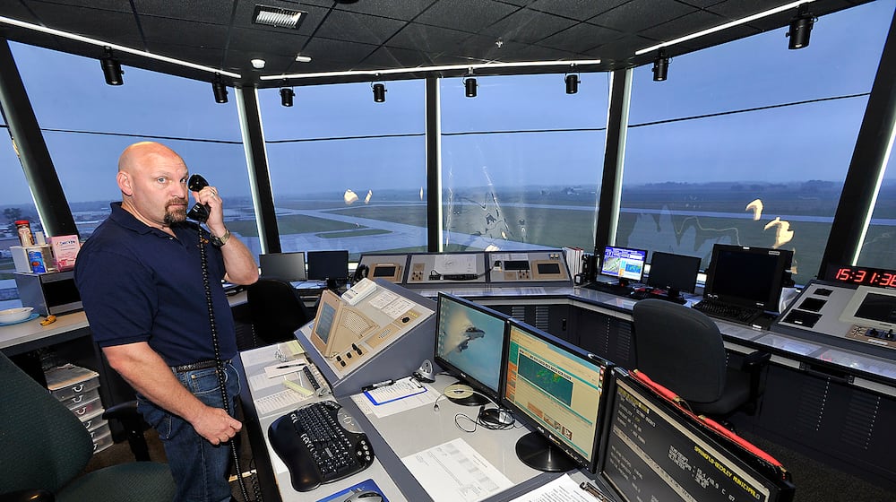 Bill Masseth, an air traffic controller at Springfield Beckley Municipal Airport, at work in the airport’s traffic control tower in 2013. FILE