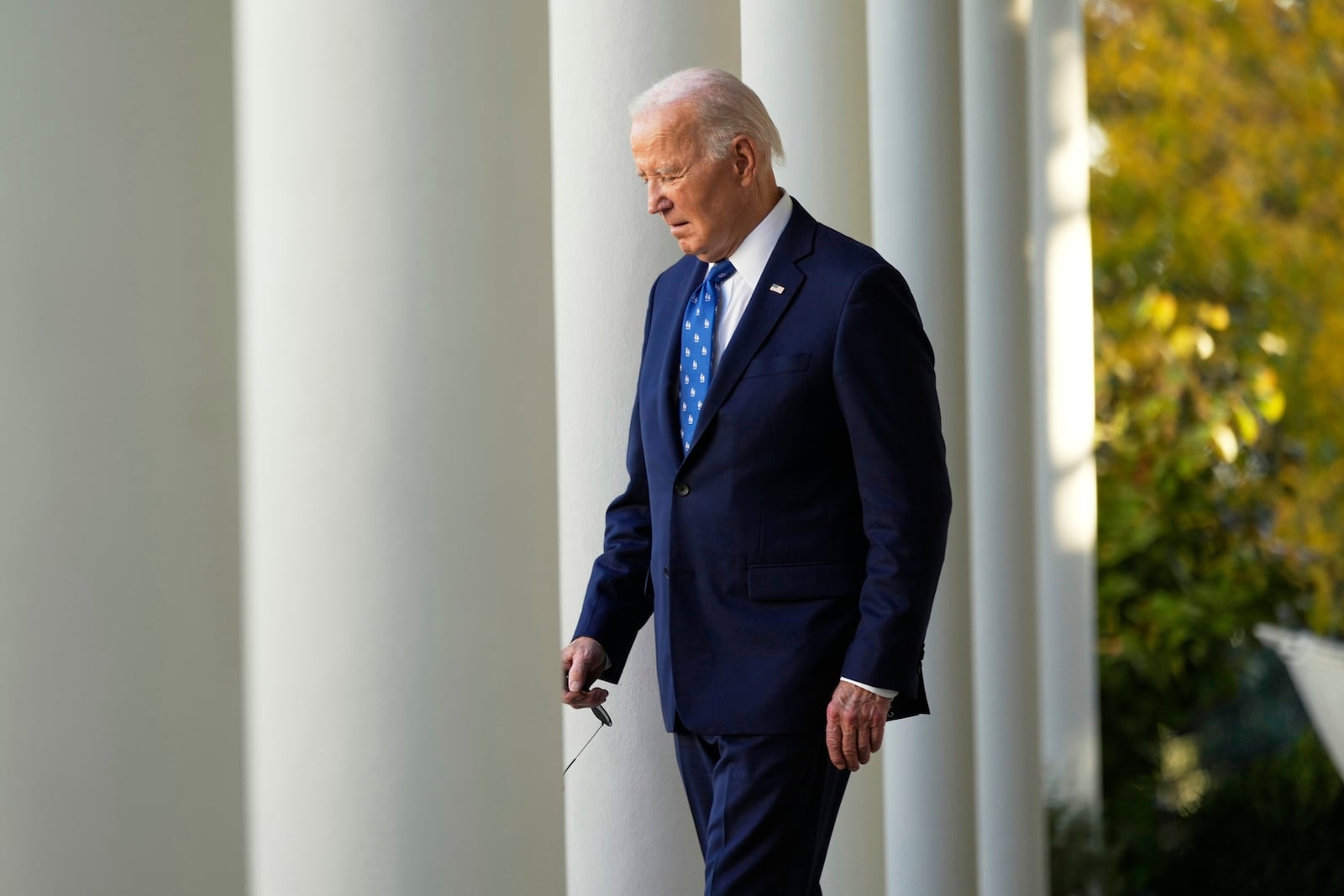 FILE - President Joe Biden walks out to speak in the Rose Garden of the White House in Washington, Nov. 26, 2024. (AP Photo/Ben Curtis, File)