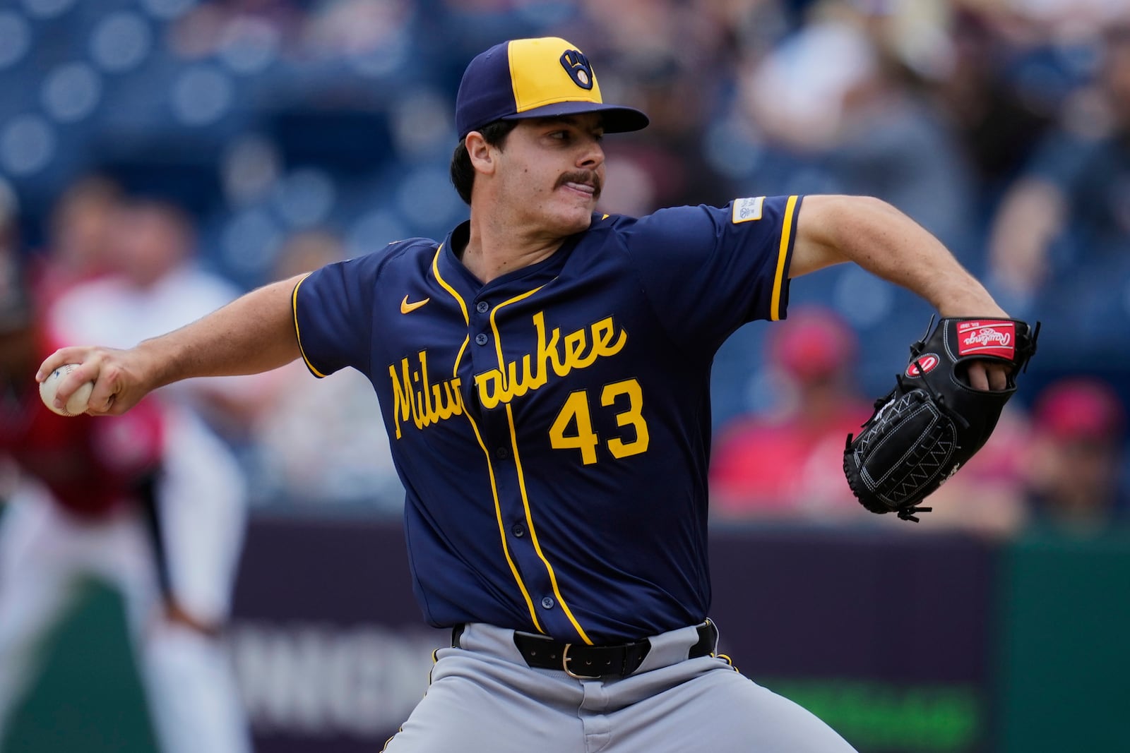 Milwaukee Brewers' Logan Henderson pitches in the first inning of a baseball game against the Cleveland Guardians in Cleveland, Wednesday, May 14, 2025. (AP Photo/Sue Ogrocki)
