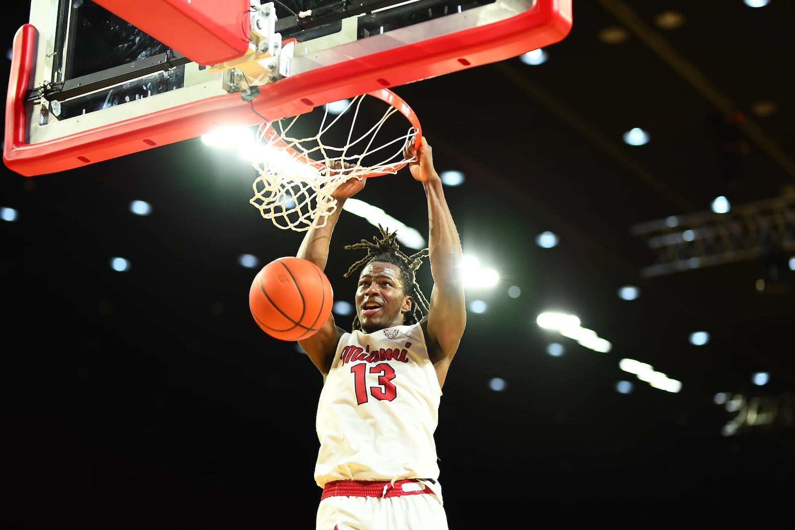 Miami's Antwone Woolfolk slams down a dunk against Old Dominion on Monday Night at Millett Hall. KYLE HENDRIX / CONTRIBUTED