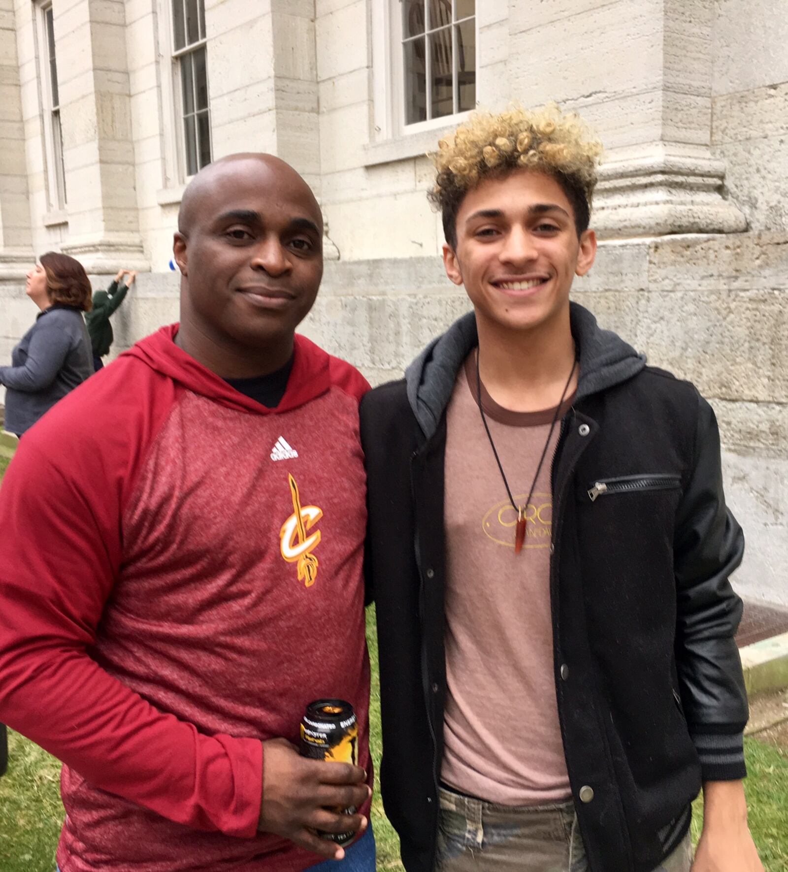 Eddie and Kaleb Barlow of Dayton attended the Dayton rally for women's rights and human rights.