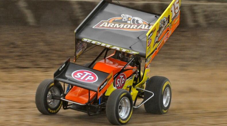 After passing several cars and running a strong second during the World of Outlaws visit to Eldora Speedway, Donny Schatz suffered a flat tire in the A-Main feature and finished 15th. The rains held off until the last five laps of the feature, which was called a race after 25 of 30 laps were completed Friday, May 7. Joey Saldana (9) won the event in convincing fashion followed by Lucas Wolfe and Steve Kinser. Contributed photo by Ronald Laymon