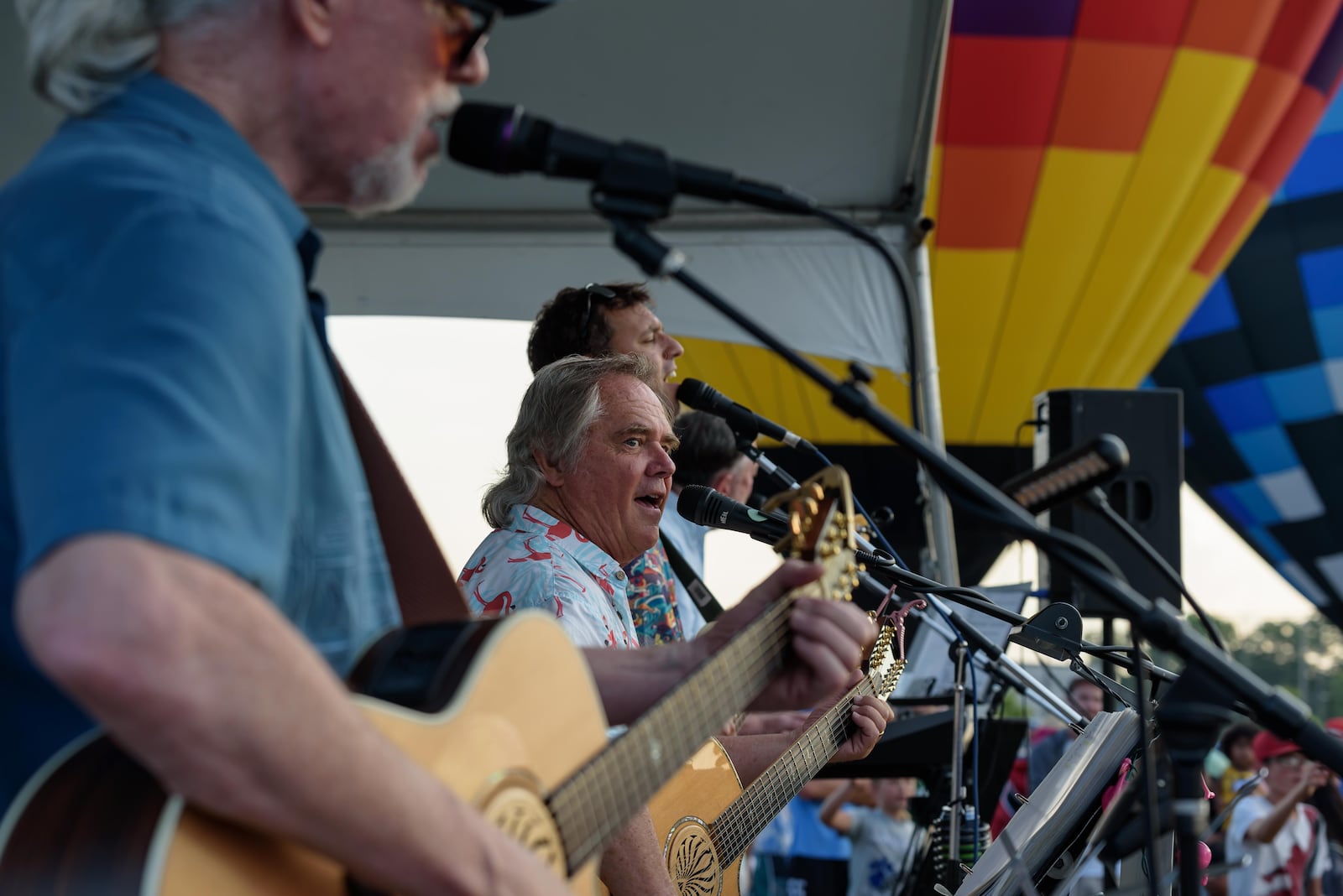 The city of West Carrollton hosted a hot air balloon glow by the Askren Air Balloon Team with food trucks, beer and a concert featuring The Fries Band on Friday, July 12, 2024. The band will perform Friday, July 10 at Stubbs Park in Centerivlle. TOM GILLIAM / CONTRIBUTING PHOTOGRAPHER
