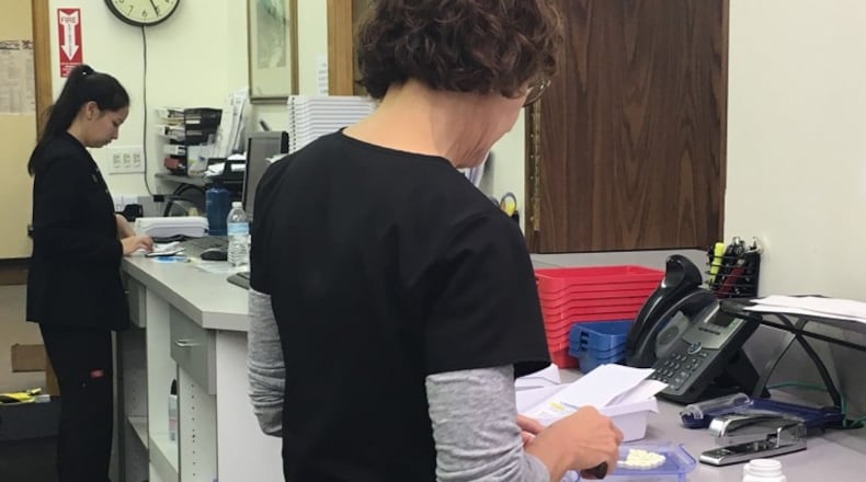More than 90 pharmacies in Ohio closed their doors last year and others say they may have to do the same because of a dramatic decrease in reimbursements from Medicaid managed care plans. KATIE WEDELL/STAFF