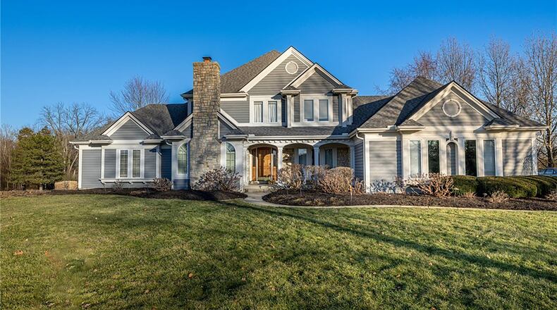 The five bedroom two story sits on nearly a three acre wooded lot in Washington Township. It has a three car attached side entry garage and fenced back yard.