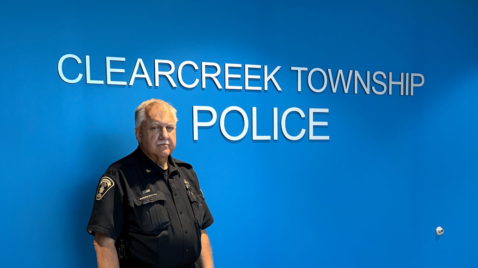 Clearcreek Twp. Police Chief John Terrill stands in the lobby of the police department at 7705 Bunnell Hill Road. JEN BALDUF/STAFF