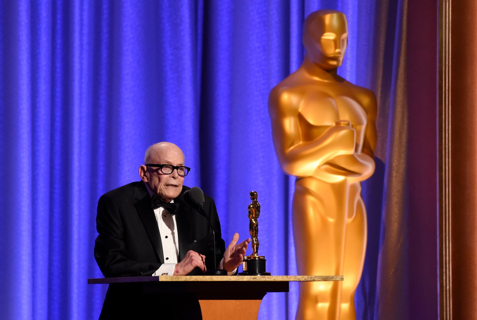 FILE - Publicist Marvin Levy accepts his honorary Oscar award at the 2018 Governors Awards in Los Angeles on Nov. 18, 2018. (Photo by Chris Pizzello/Invision/AP, File)