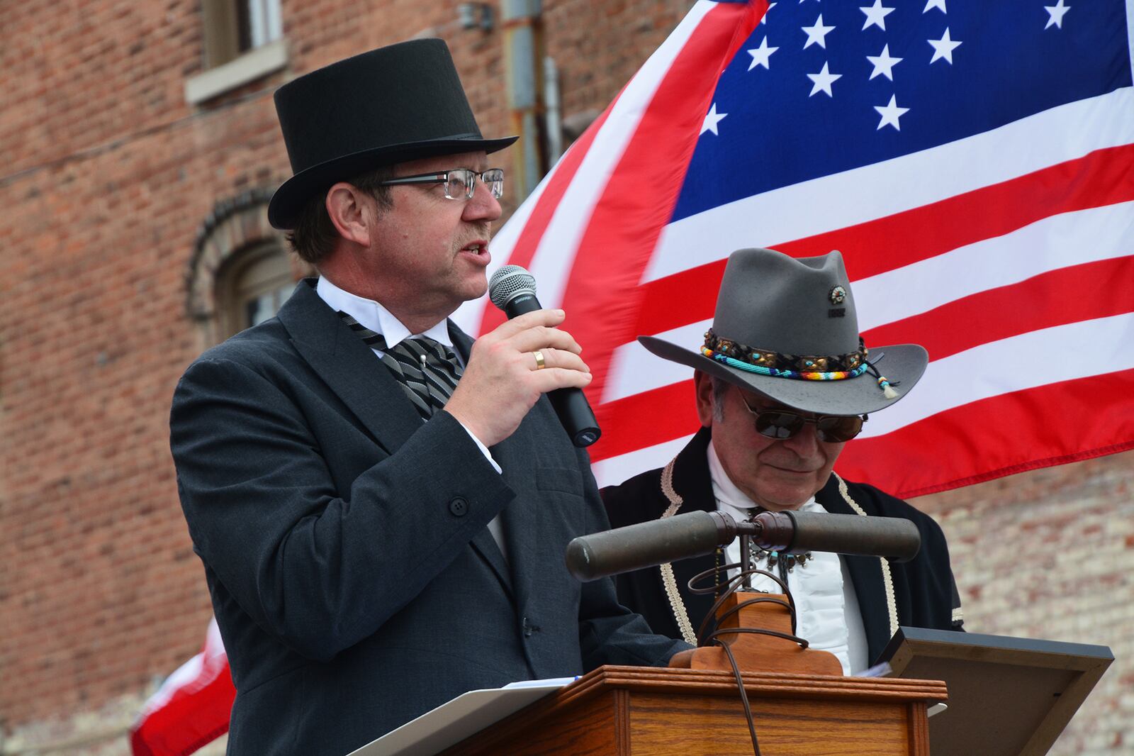 Tipp City Mayor Pat Hale (left) and resident Ron Re participate in the Tipp City 175th anniversary celebration during the 2015 July 4 weekend. The celebration sparked rebirth of expanded community July 4 activities that continue this year. CONTRIBUTED