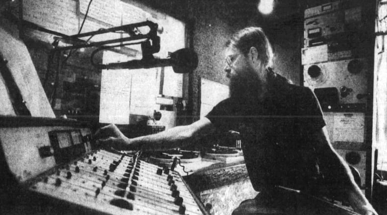 Paul De La Vergne, a WYSO volunteer, prepares to cue up some jazz during his Wednesday afternoon program in 1986. DAYTON DAILY NEWS ARCHIVES
