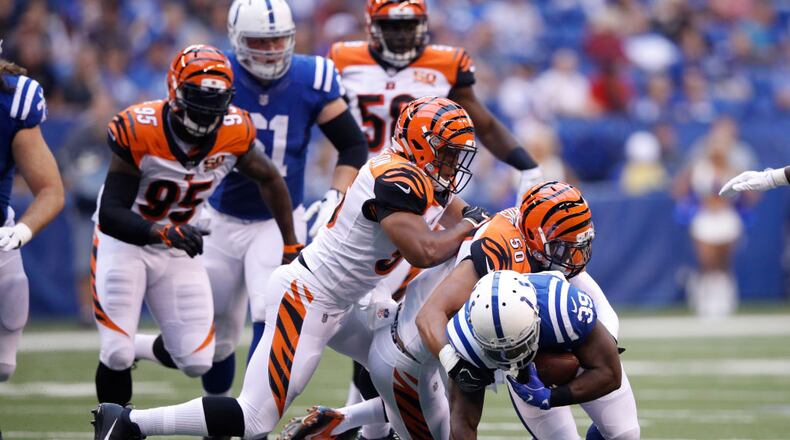 INDIANAPOLIS, IN - AUGUST 31: Jordan Evans #50 and Hardy Nickerson #56 of the Cincinnati Bengals tackle Troymaine Pope #39 of the Indianapolis Colts in the first half of a preseason game at Lucas Oil Stadium on August 31, 2017 in Indianapolis, Indiana. (Photo by Joe Robbins/Getty Images)