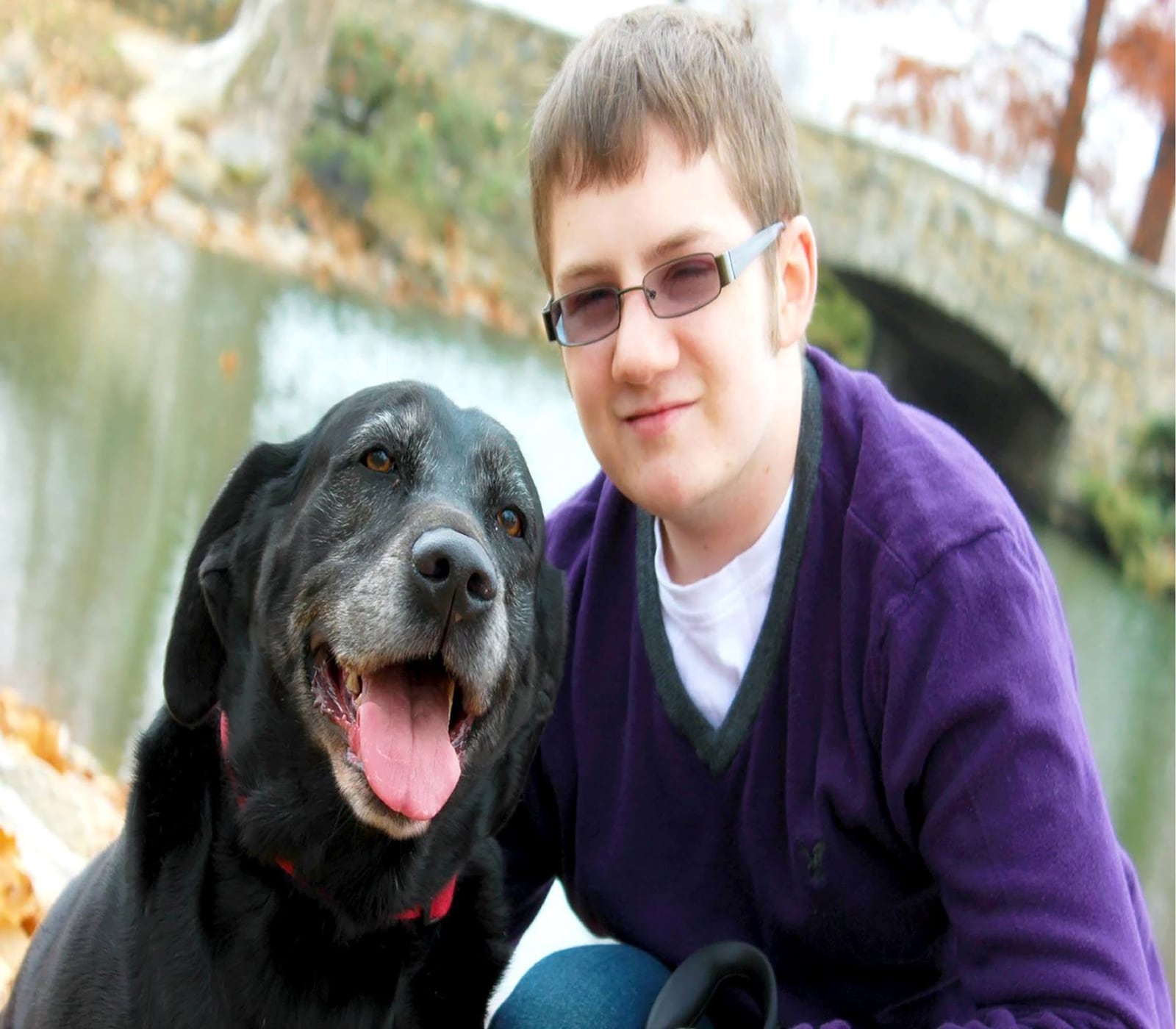 A fully recovered and cancer free Brenner as a teenager in Vandalia with dog Daphne.