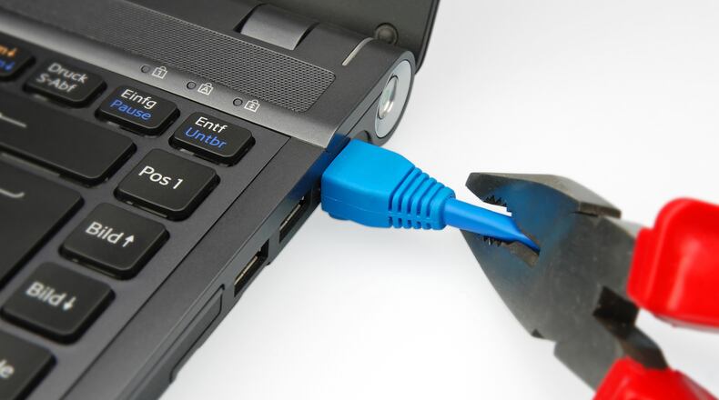 Isn't taking a minute to enjoy a breathtaking view or your child's laughter more important than a corporate email? (Dreamstime/TNS)