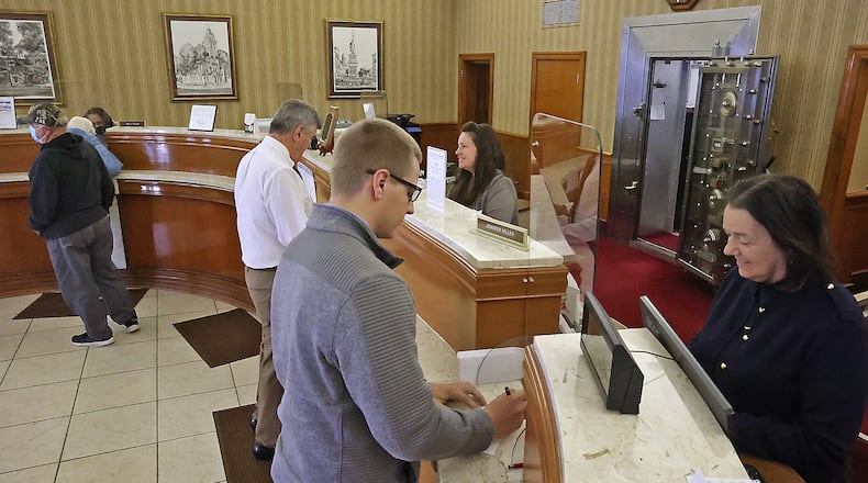 The lobby of Perpetual Federal Savings Bank in Urbana Wednesday, May 10, 2021. BILL LACKEY/STAFF
