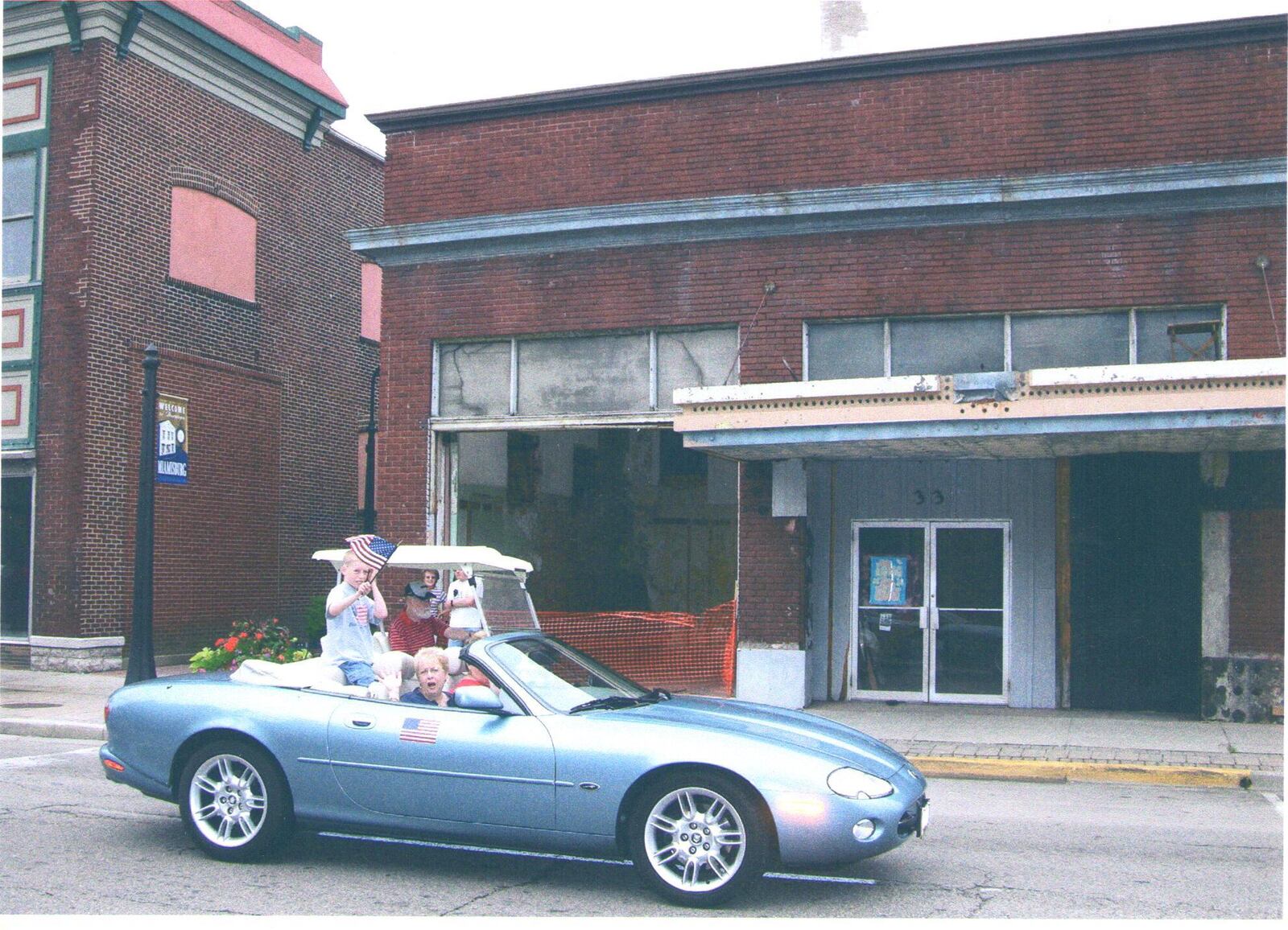 Exterior historical photo of the Plaza Theatre during a parade, undated. Courtesy of The Historic Plaza Theatre.