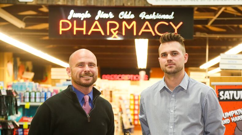 Jason Groves and Taylor Hutcheson of Jungle Jim’s Pharmacy. The pharmacy began assembling “comfort packets” filled with medications that treat withdrawal symptoms that doctors, rehab treatment facilities and hospitals around the state could have quickly filled for patients.