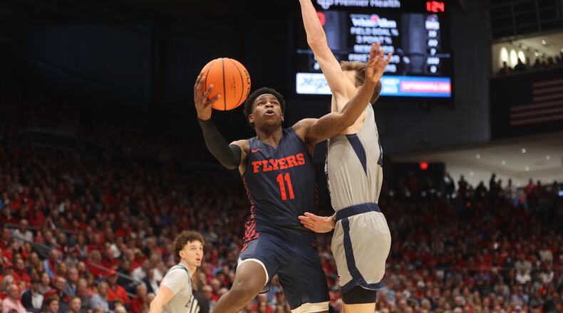 Dayton's Malachi Smith shoots against Robert Morris on Saturday, Nov. 19, 2022, at UD Arena. David Jablonski/Staff