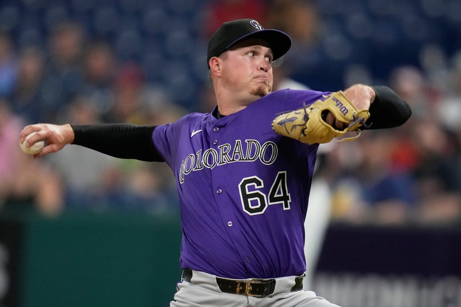 Colorado Rockies' Bradley Blalock (64) pitches in the first inning of a baseball game against the Cleveland Guardians in Cleveland, Monday, July 28, 2025. (AP Photo/Sue Ogrocki)