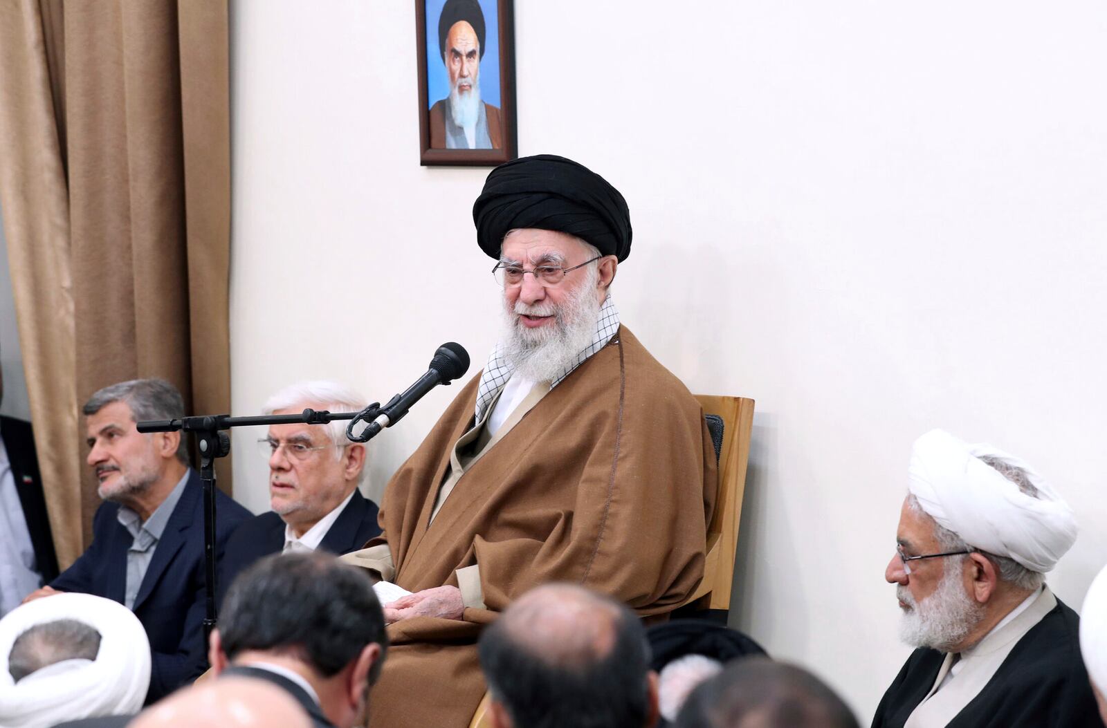 In this photo released by the official website of the office of the Iranian supreme leader, Supreme Leader Ayatollah Ali Khamenei speaks in a meeting with a group of top officials, in Tehran, Iran, Tuesday, April 15, 2025. (Office of the Iranian Supreme Leader via AP)