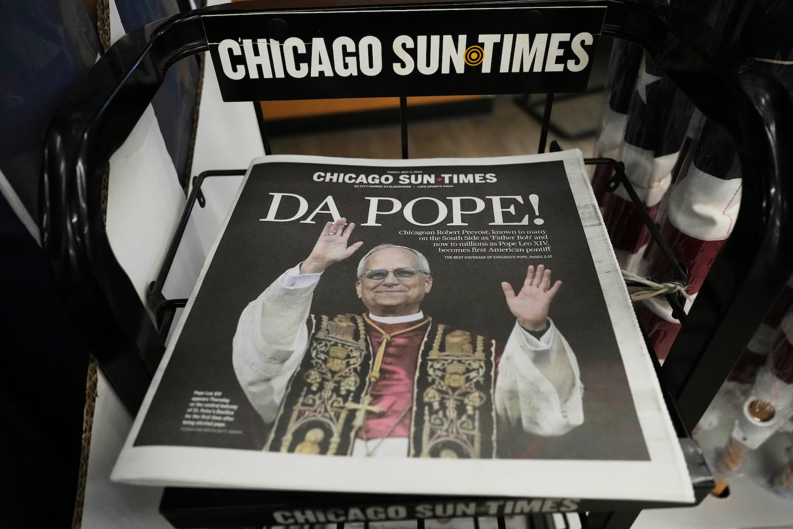A Chicago Sun-Times newspaper front page shows "DA POPE!" at a grocery store in Mount Prospect, Ill., Thursday, May 9, 2025. (AP Photo/Nam Y. Huh)