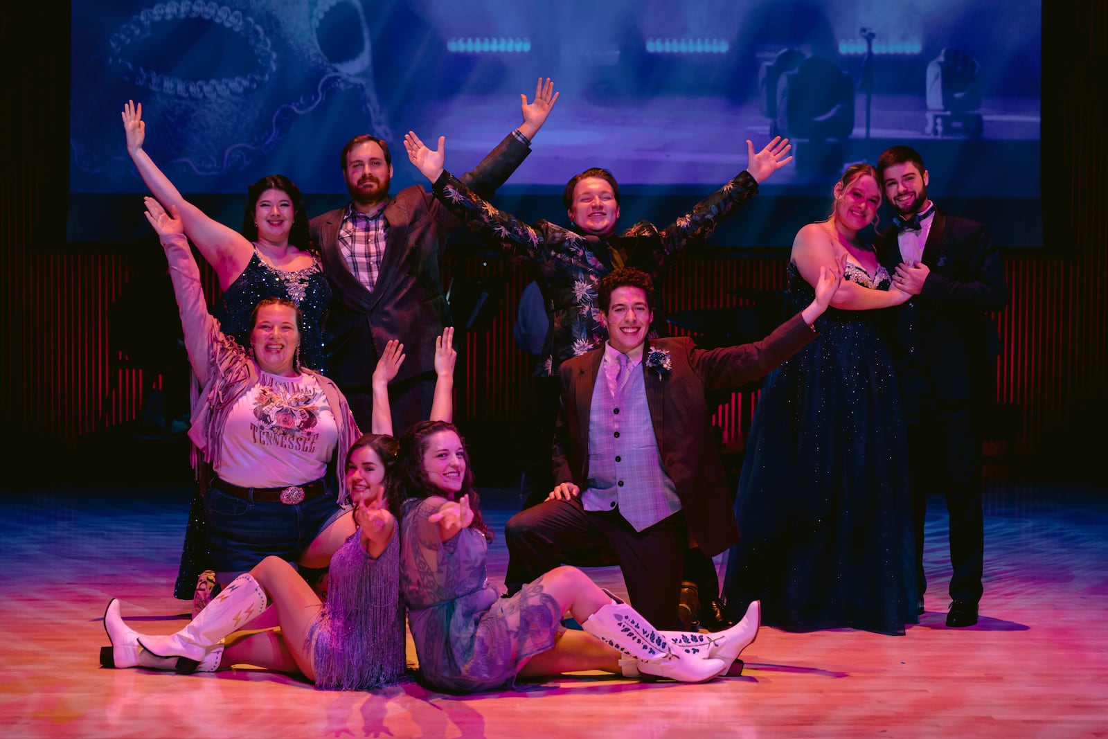 Left to right: Top row: Charlotte Dilvidi (Lulu), Dylan Reynolds (Craig Miller), Henry Riesbeck (Barry Rosenbrightmore III), Katrina Lagodzinski (Genevieve Carrington), Luke De Villiers (Everett Lark); Middle row: Kat Bishop (Lorelai Leigh Evans), Connor Veal (Percy Argall); Front row: Annie Hart (McBrinzleigh Rose LaRue) and Samantha McIntyre (Chardonnay von Sparkles) in the University of Dayton's production of "Fledermaus Unmasked." Photo by Knack Video + Photo 