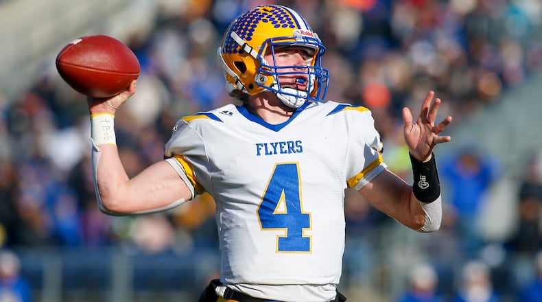 Marion Local High School senior Peyton Otte throws the ball during the Division VII state championship game at Tom Benson Hall of Fame Stadium in Canton on Dec. 4, 2021. Otte on Monday was named first-team, All-Ohio as a defensive back. lMichael Cooper/CONTRIBUTED