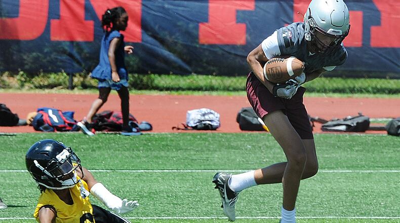 The Miami Valley Football Coaches Association held its second Social Justice 7 on 7 football competition Tuesday July 12, 2022 in Dayton. Urbana High School and Meadowdale High School were two of forty teams from the area took part in the event that was open to the public. MARSHALL GORBY\STAFF