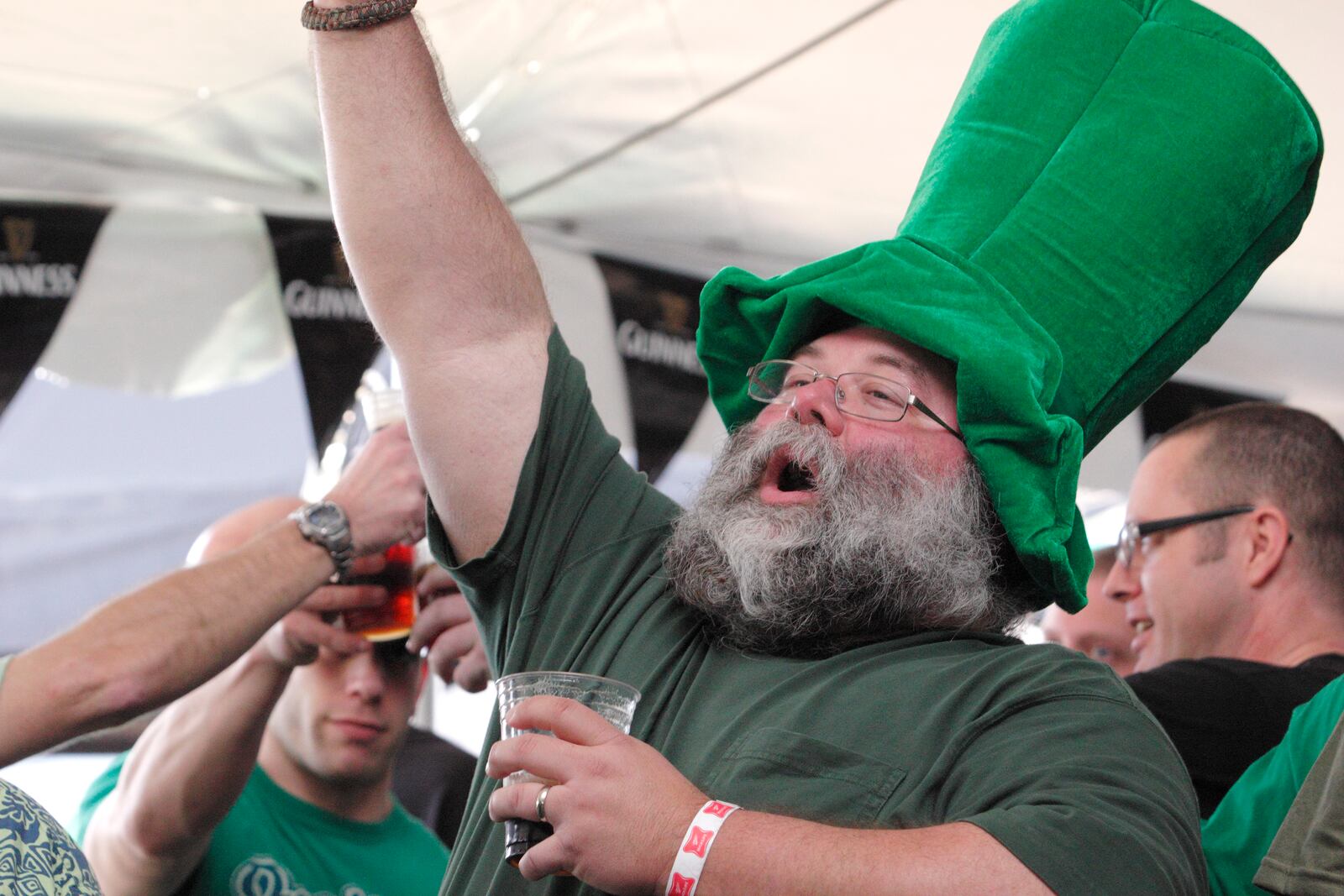 Audience members as Dulahan performs during the St. Patrick's Day celebration at the Dublin Pub in downtown Dayton, Saturday, March 17, 2012.