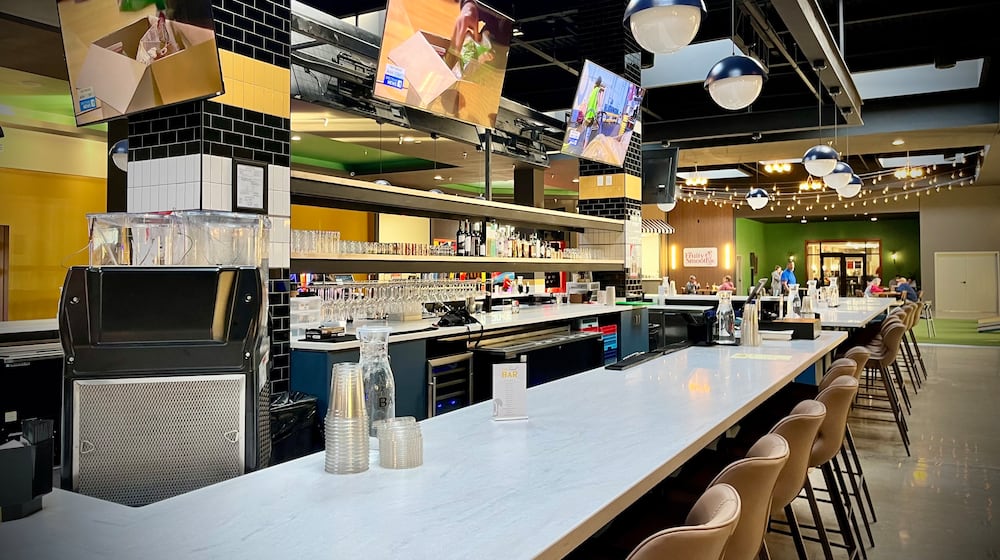 The food court at the former Miami Valley Centre Mall in Piqua has been transformed into The Social at Piqua Center, a dining and entertainment destination. NATALIE JONES/STAFF