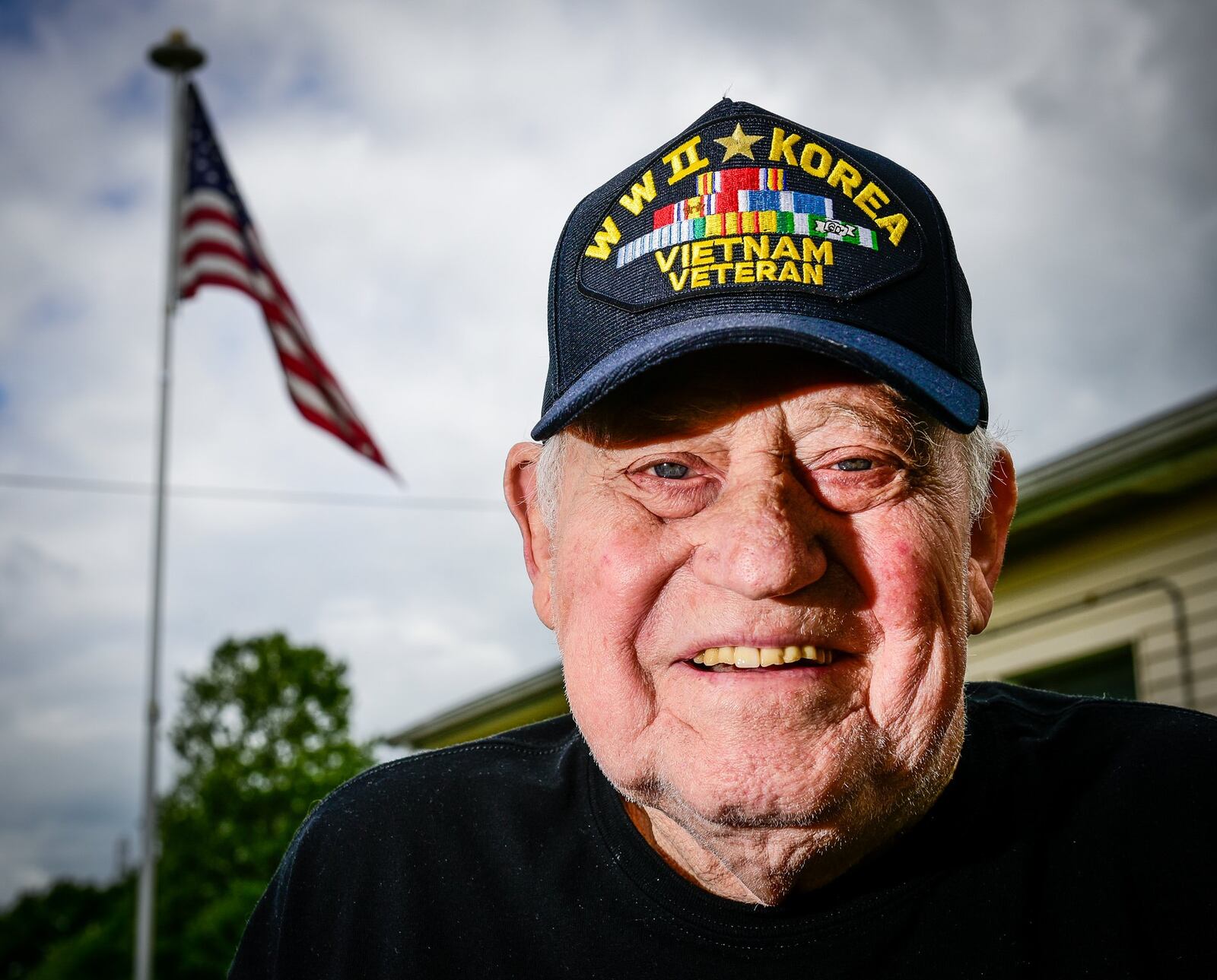 Cecil Daily, 89, proudly wears a black baseball hat embroidered with “WWII, Korean, Vietnam Veteran.” When asked about the hat, he says: “You can’t buy this thing.” NICK GRAHAM/STAFF