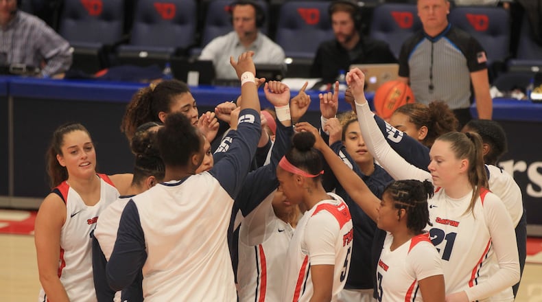 Dayton huddles before a game against Toledo on Wednesday, Nov. 17, 2021, at UD Arena. David Jablonski/Staff