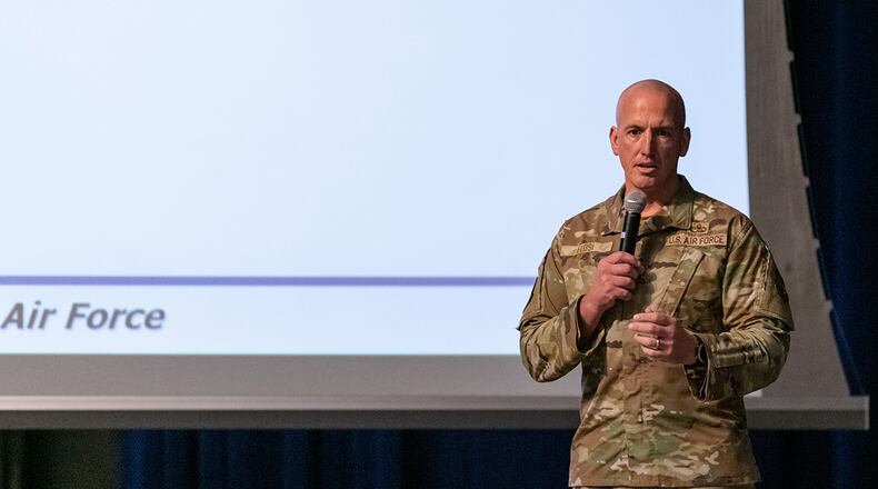 Chief Master Sgt. David A. Flosi, Air Force Materiel Command command chief, discusses how Airmen assigned to Space Force installations will receive functional support from the AFMC during a town hall at Patrick Space Force Base, Florida, Oct. 29. AFMC is the servicing major command to U.S. Space Force and provides functional support to Airmen assigned to Space Force installations. U.S. AIR FORCE PHOTO/AMANDA RYRHOLM