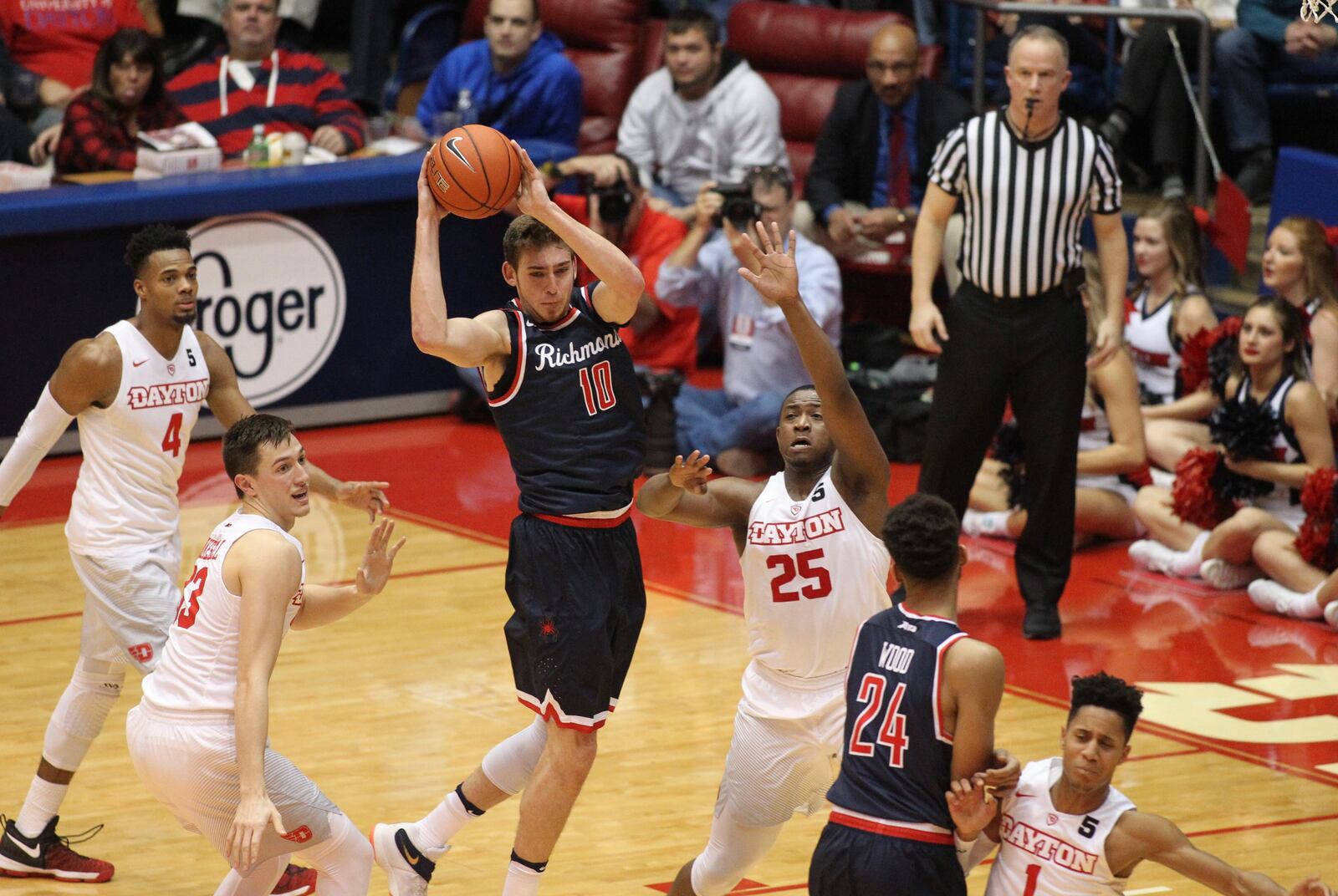 Richmond’s T.J. Cline makes a pass against Dayton on Jan. 19, 2017, at UD Arena. David Jablonski/Staff