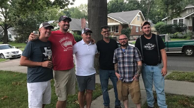 Mitch Benjamin, left, of the award-winning Meat Mitch competitive barbecue team, and team member Bruce Trecek, third from left, shared competition barbecue tips with local chefs Charles d'Ablaing, Michael Foust of The Farmhouse, Vaughn Good and chef de cuisine Jamie Everett of Hank Charcuterie in Lawrence, Kan., on August 17, 2017. (Jill Wendholt Silva/Kansas City Star/TNS)