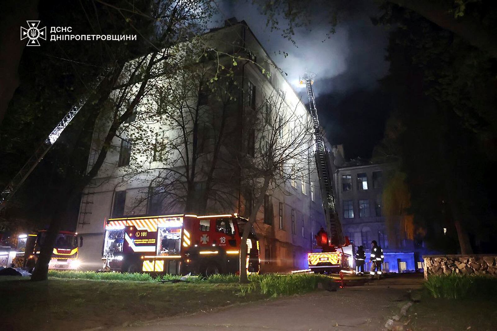 In this photo, provided by the Ukrainian Emergency Service, firefighters extinguish fire following a Russian attack in Dnipro, Thursday, April 17, 2025. (Ukrainian Emergency Service via AP)
