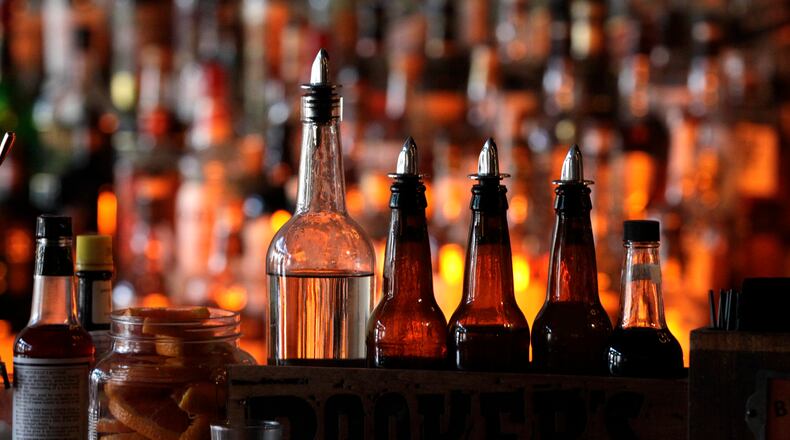 Daytonâs Century Bar has reopened in the three-story former Dayton Power and Light building, 18 S. Jefferson St. The historic cherry wood bar, the centerpiece of the original Century Bar, has been restored and installed in the new expanded space. Century Bar is co-owned by Diane Spitzig and Joseph Head. LISA POWELL / STAFF