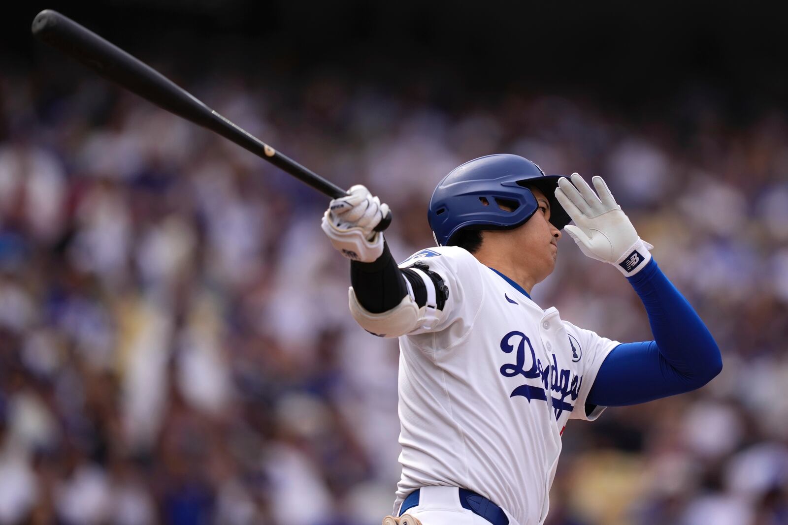 Los Angeles Dodgers' Shohei Ohtani takes a strike during the first inning of a baseball game against the New York Yankees, Sunday, June 1, 2025, in Los Angeles. (AP Photo/Mark J. Terrill)