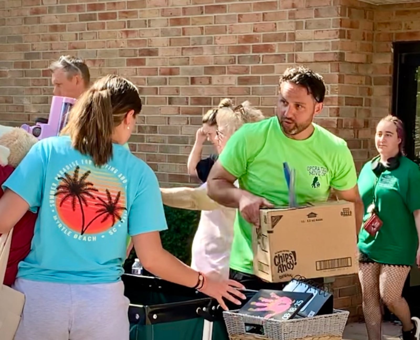 Volunteers welcomed the largest cohort of on-campus students to Wright State University in more than ten years, Monday, Aug. 18, 2025. LONDON BISHOP/STAFF