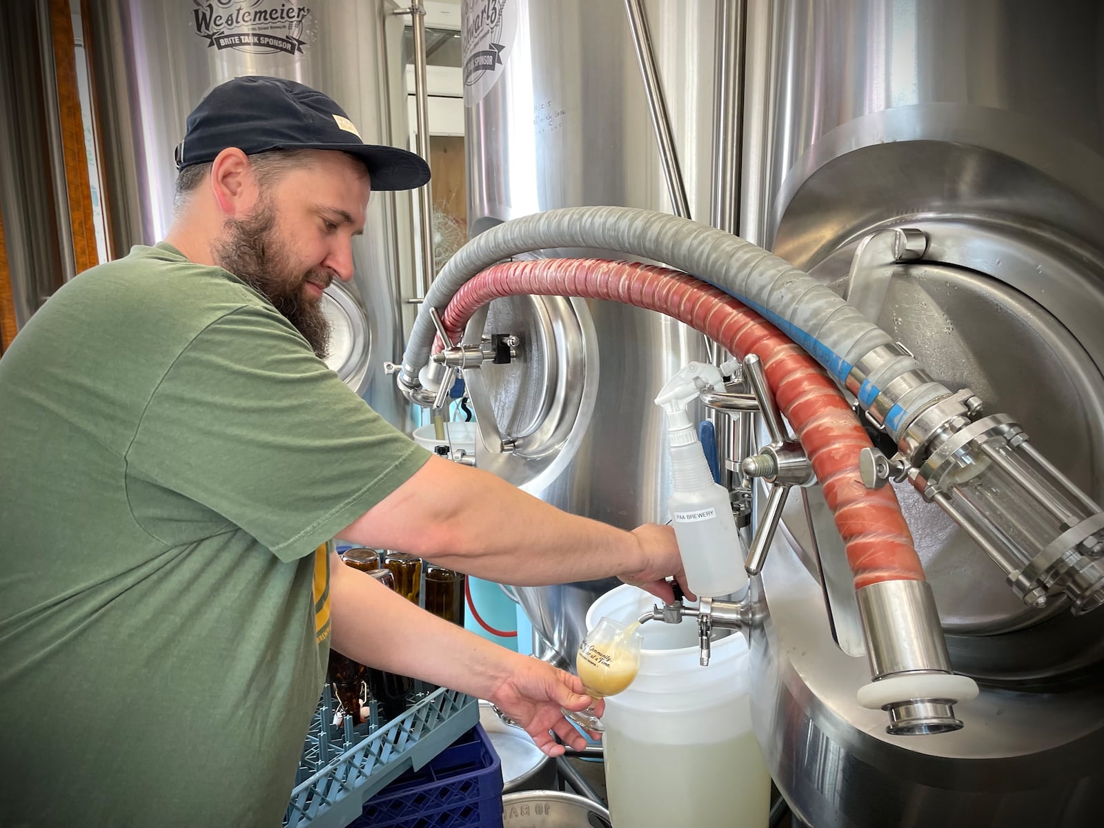 Fifth Street Brewpub is located at 1600 E. Fifth St. in Dayton's St. Anne's Hill neighborhood. Pictured is general manager and head brewer Jon Naghski. NATALIE JONES/STAFF