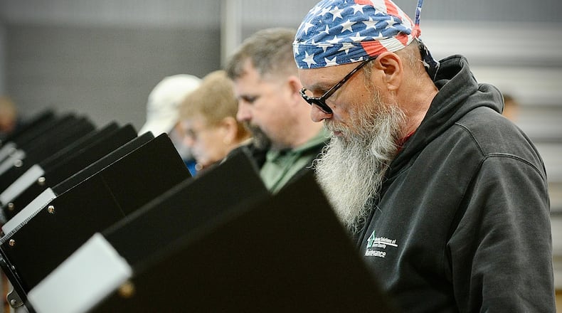 Paul Neill votes Tuesday, March 19, 2024 at the Xenia community Center. MARSHALL GORBY \STAFF