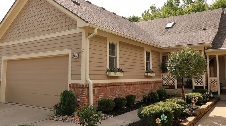 The 4-bedroom condominium has about 2,860 sq. ft. of living space. The unit is one of a 4-unit building with its own 2-car garage. The community offers a swimming pool, clubhouse and walking trails. CONTRIBUTED PHOTO BY KATHY TYLER