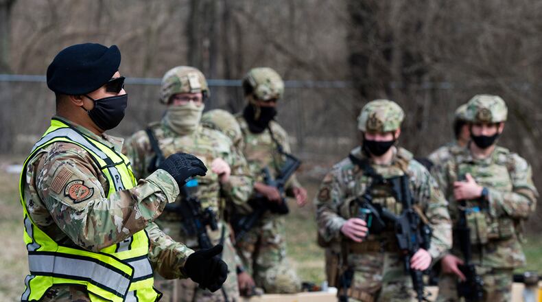 Staff Sgt. Jacob Reyes, 88th Security Forces Squadron unit training instructor, yells instructions at a fellow SFS member during sustainment training at Wright-Patterson Air Force Base on March 17. This type of training is required twice a year for Security Forces personnel to maintain weapons certifications. U.S. AIR FORCE PHOTO/WESLEY FARNSWORTH